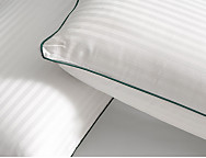 Almohada Bambú Ribete doble funda. Firmeza Media-Alta.